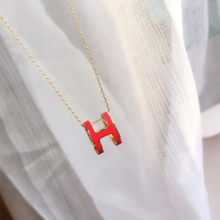 HM CLIC RED ENAMEL GOLD NECKLACE