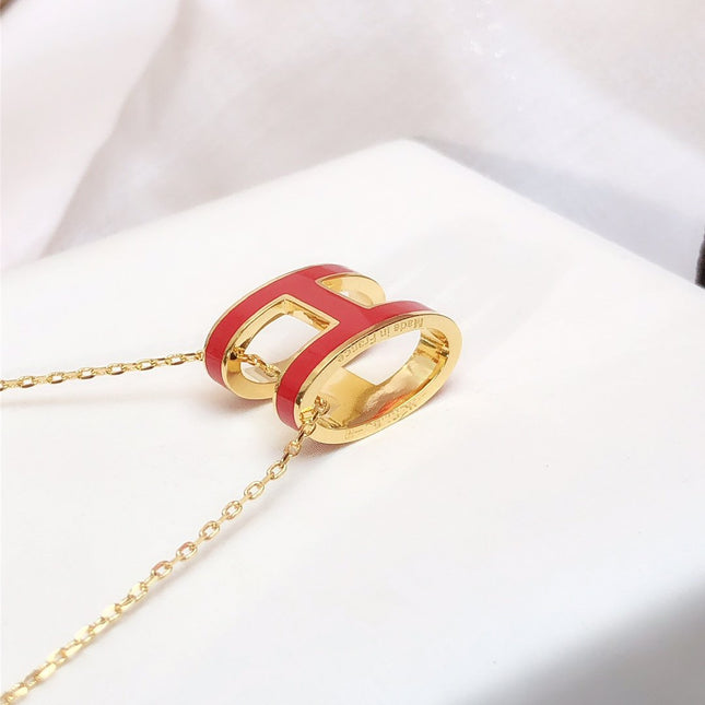 HM CLIC RED ENAMEL GOLD NECKLACE