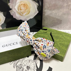 HAIRBAND IN WHITE FLORAL FABRIC 385855