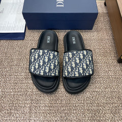 DIOR 25S ALIAS SLIDES IN BLACK CALFSKIN WITH CD OBLIQUE DEEP BLUE LOGO