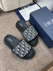 DIOR 25S ALIAS SLIDES IN BLACK CALFSKIN WITH CD OBLIQUE DEEP BLUE LOGO